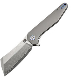 A gray folding knife with a Damascus steel blade and titanium handle, featuring an extended tang, lanyard hole, and pocket clip. | King of Knives e-store