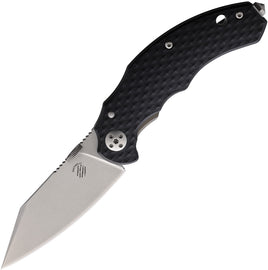 Bastinelli Creations D Vil Mini Dragotac Framelock - A foldable hunting knife with a stonewash finish blade and black G10 handle with bronze titanium back handle, featuring a thumb disk, lanyard hole, and glass breaker.