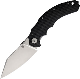 A folding knife with a black sculpted G10 handle and a stonewash finish stainless steel blade, featuring a titanium back handle, glass breaker, thumb disk, lanyard hole, and pocket clip.