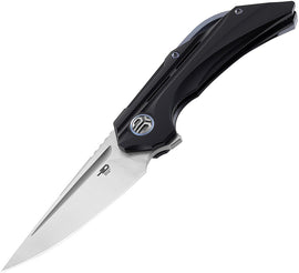 A black folding knife with a satin finish blade, black titanium handle, and pocket clip, closed position.