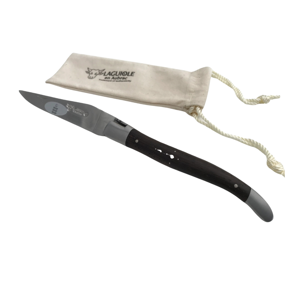 LAGUIOLE EN AUBRAC Folding Knife (12cm) with Wenge Wood Handle. This traditional pocket knife, expertly crafted from high-quality steel and featuring a Wenge wood handle, is perfect for picnics, camping, or any outdoor adventure.