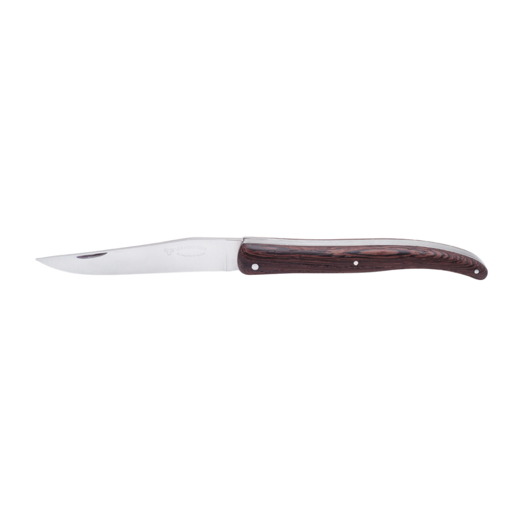 LAGUIOLE EN AUBRAC BACKPACKER'S FOLDING KNIFE (12CM) - WENGE WOOD. This pocket knife features a Wenge wood handle and a stainless steel blade, perfect for picnics, camping, or any outdoor adventure.
