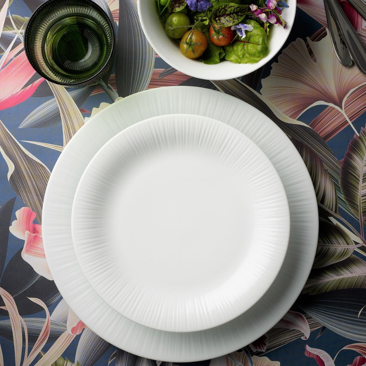 Noritake Conifere Plate and Saucer casually stacked, with Cup and Bowl positioned above, white