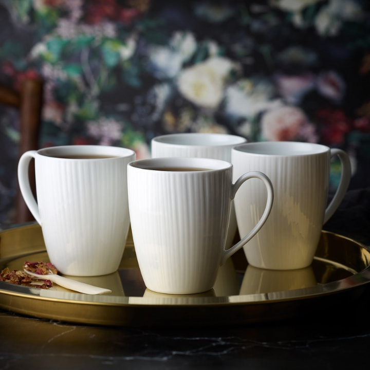 Noritake Conifere Mug Set of 4, 360ml, White, on top of a table
