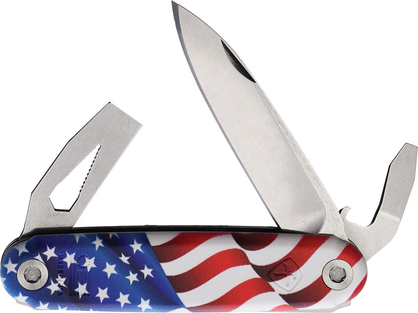A folding utility knife with an American flag design on the handle, featuring a silver blade and multiple tools extended, including a screwdriver, bottle opener, chisel, and claw opener.