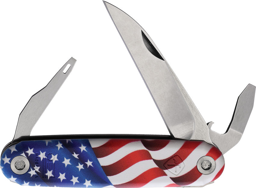 A folding knife with an American flag handle, featuring a closed blade and various tools inserted into the handle, including a bottle opener and screwdriver.