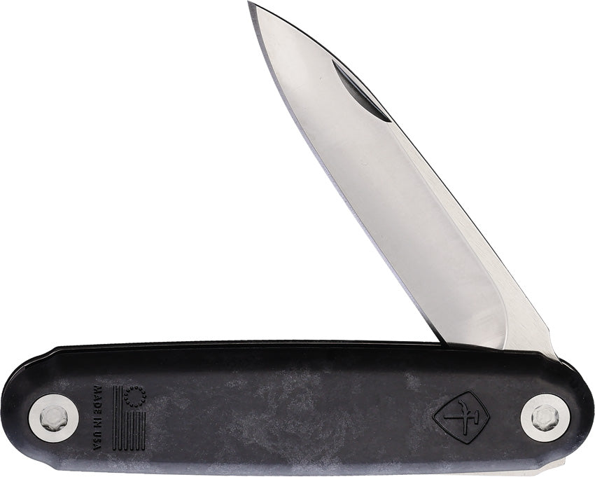 A folded pocket knife with a silver blade and black synthetic handle with a carbon fiber pattern.