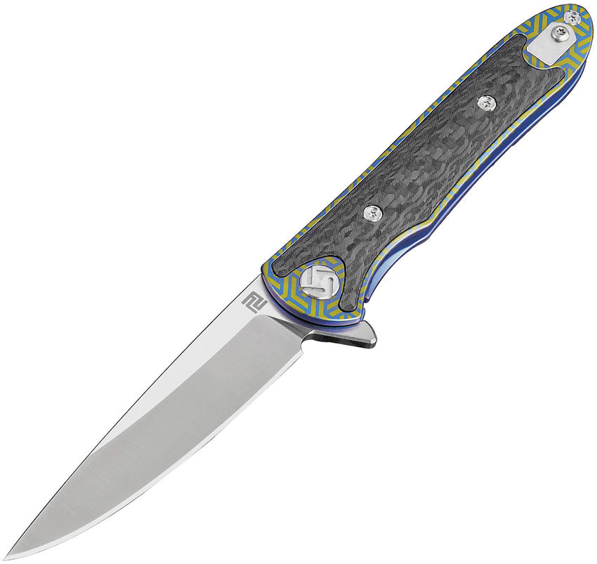 Artisan Shark Framelock Blue knife with blue and gold titanium handle, stonewash finish blade, and extended tang. Pocket clip and geometric handle pattern visible. | King of Knives e-store
