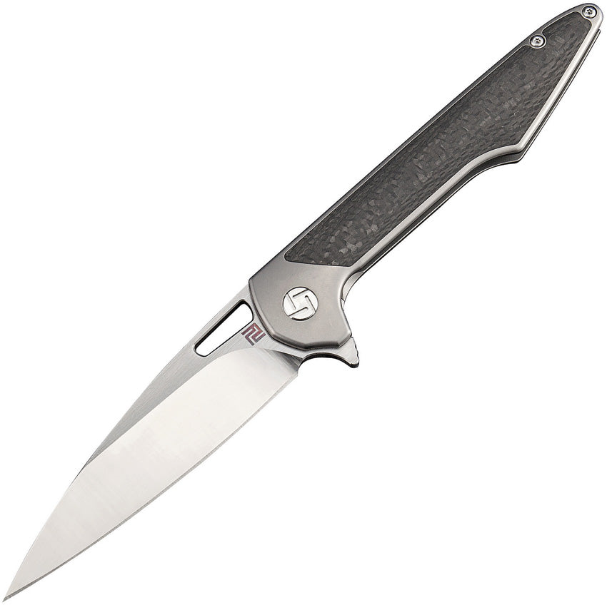 A folding knife with a gray titanium handle and a satin finish Bohler M390 stainless blade, featuring an extended tang, thumb pull, and pocket clip. The knife is partially open, displaying the blade and the handle. | King of Knives e-store