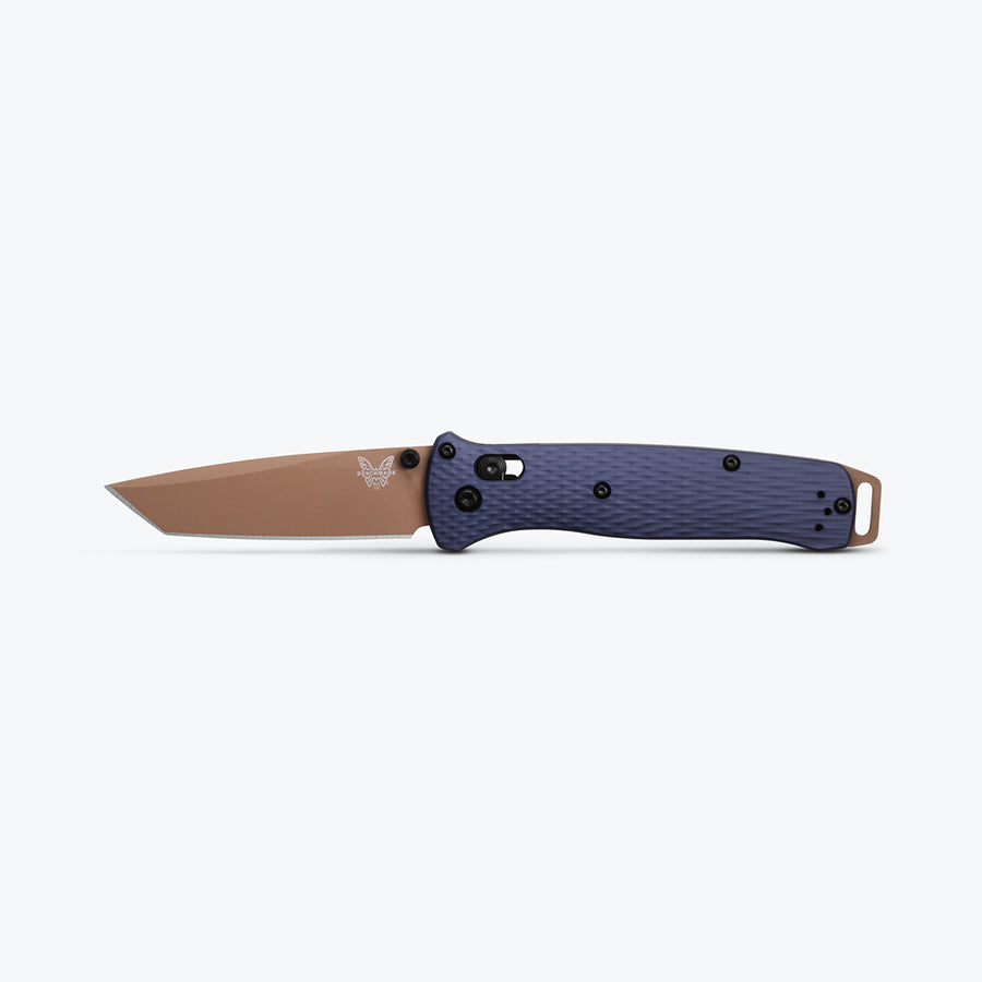 A folding knife with a brown blade and a blue handle with a textured grip.