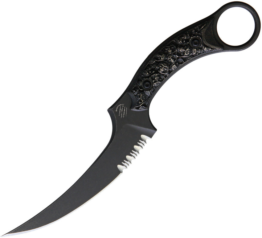 A fixed blade knife with a black stonewash finish partially serrated curved blade and a bronze skull handle. The knife is partially unsheathed, displaying the blade and handle.