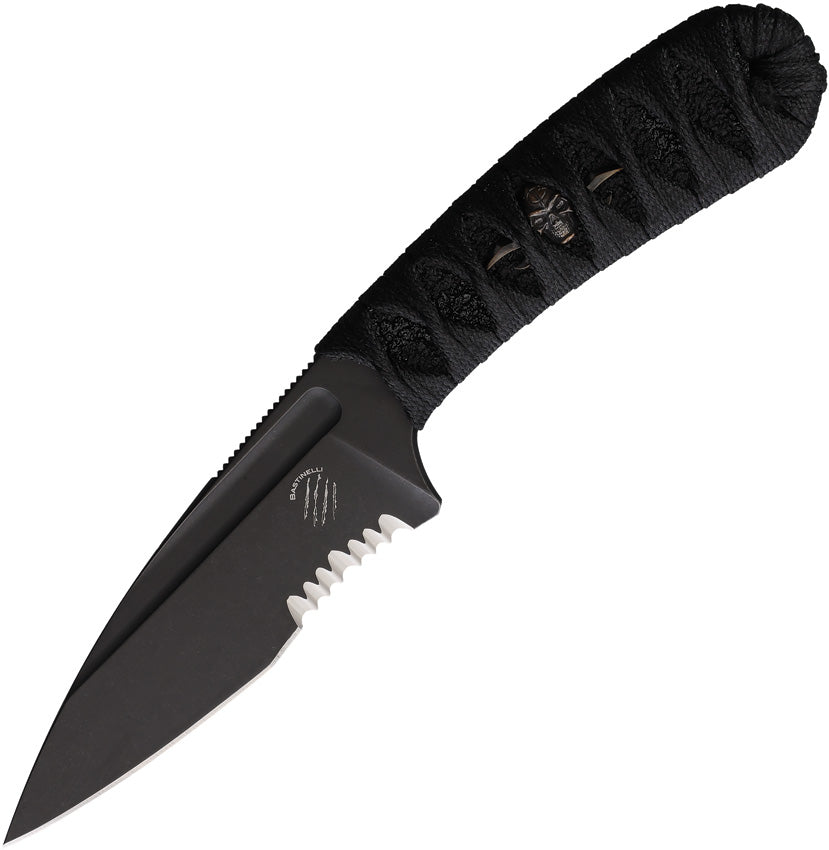 A black fixed blade knife with a serrated edge and a black cord wrapped handle, featuring a bronze Menuki in the handle and a black Kydex sheath.