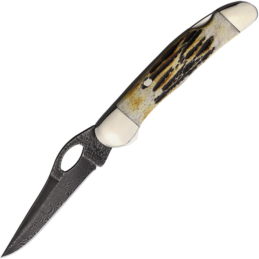 A Bear & Son folding knife with a Damascus steel blade and a patterned handle featuring nickel silver bolster. | King of Knives e-store