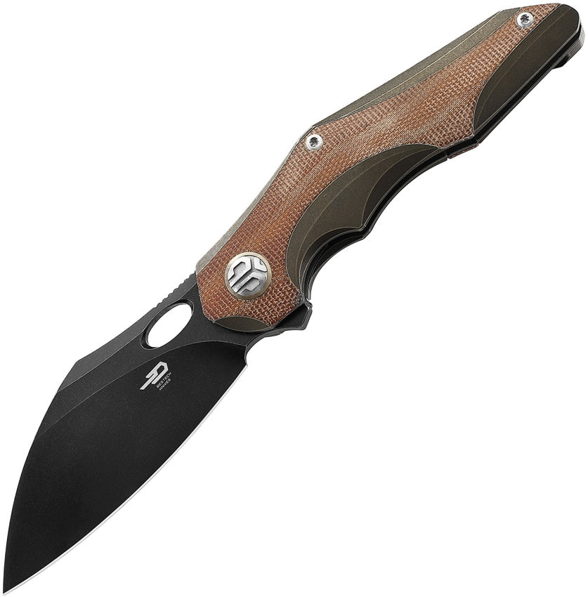 A folded knife with a black stonewash finish blade and bronze stonewash finish titanium handle with natural canvas micarta inlay, featuring a thumb pull and pocket clip.