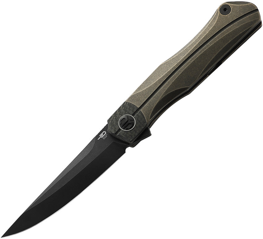 A folding knife with a bronze stonewash finish titanium handle and a black stonewash finish blade, featuring a carbon fiber inlay and an extended tang. The knife is partially open, displaying the blade and the handle.