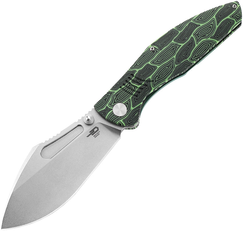 A folding knife with a black and green G10 handle and a stonewash finish Bohler M390 stainless blade, featuring a titanium frame and a pocket clip.