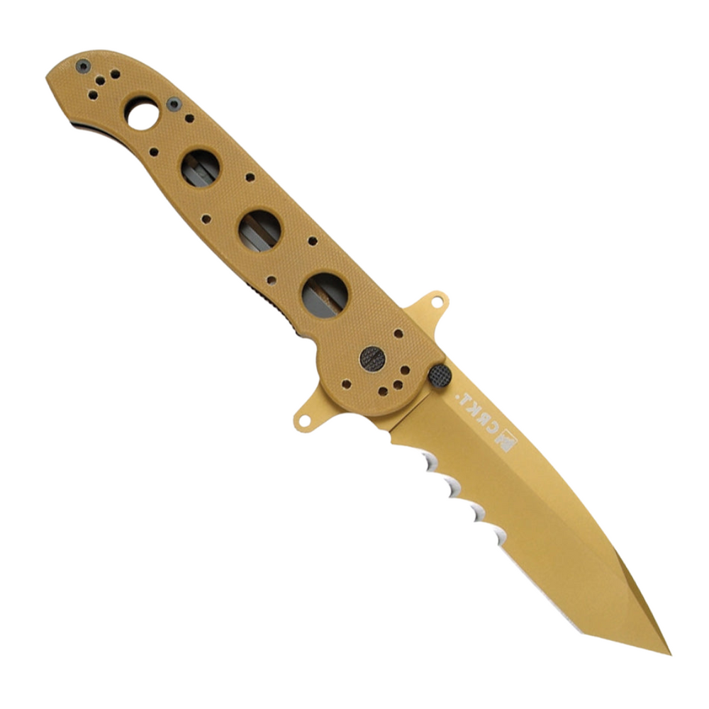 CRKT M16 Big Dog Pocket Knife. Features a 4-inch desert tan serrated tanto blade for tough cuts, tan G10 handle for secure grip, and a pocket clip for easy everyday carry. Includes a lanyard hole and AutoLAWKS safety for secure use.