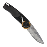 Mantis Gearhead Linerlock Dam CF, a Pocket Knife with a Unique Gear Mechanism. Features a 3-inch Damascus Steel Drop Point Blade and Carbon Fiber Handle.