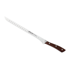 Arcos Natura Slicing Knife (Flexible-Granton Edge) 250mm. This knife features a comfortable warm rosewood handle and a single-forged NITRUM stainless steel blade with a Granton edge ideal for thin, clean cuts of meat