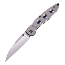 WE Knife Co. Ltd Schism Framelock Pocket Knife. Features a 2.88-Inch Stonewash Finish CPM S35VN Stainless Steel Blade, Gray Titanium Handle with Blue Accents, and Pocket Clip.