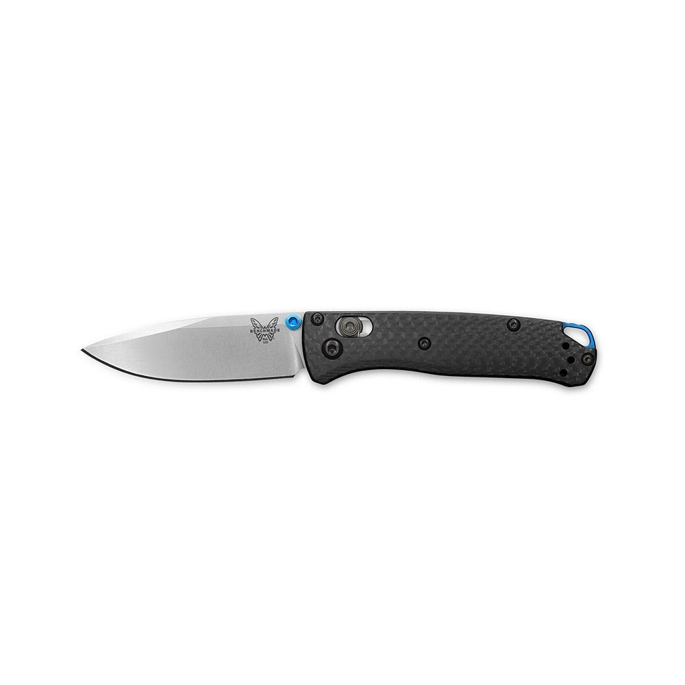 A Benchmade 533-3 Mini Bugout folding knife with a black carbon fiber handle and a silver-colored blade.