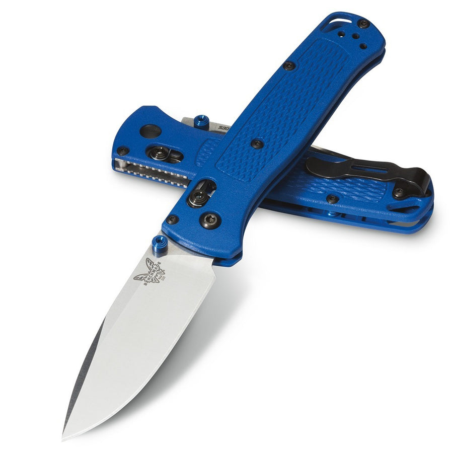 A folding knife with a blue handle and a partially serrated silver blade, open and displaying the Benchmade brand.