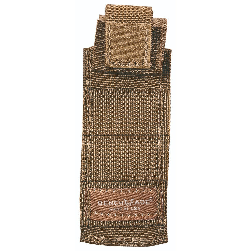 A brown Benchmade folder pouch with a snap-over hood closure, designed for knife carry, compatible with MOLLE system.