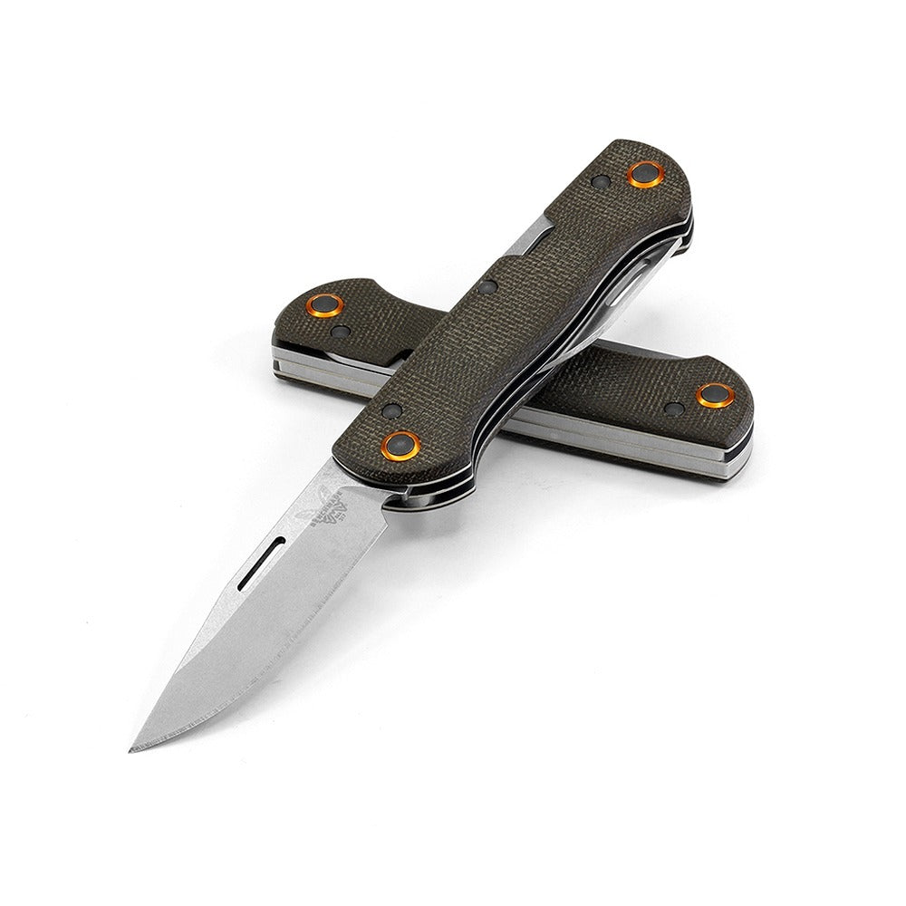 A folding knife with two black blades and orange-colored aluminium pivot rings, featuring a traditional slip joint design.